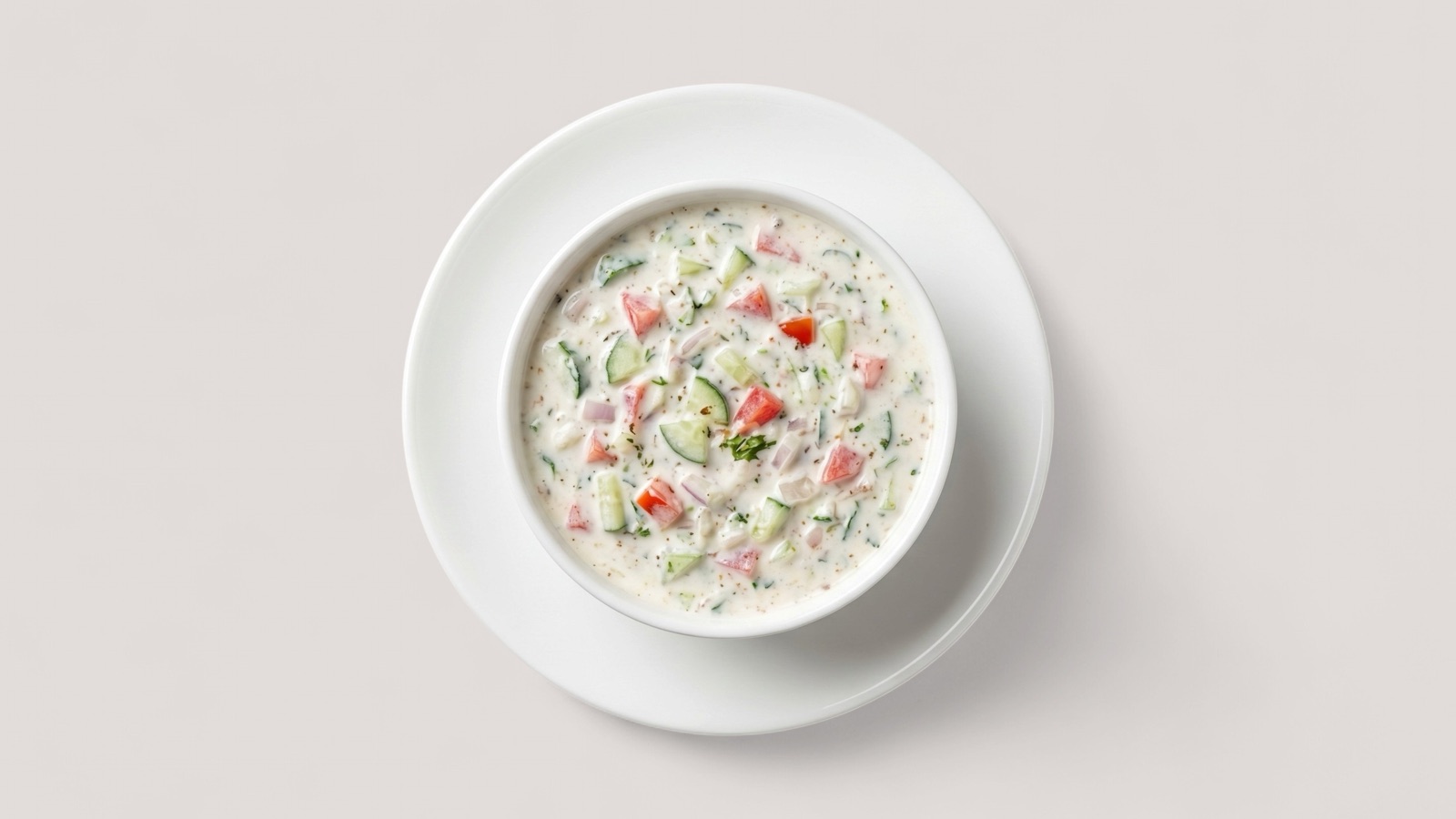 Splentify-enhanced cucumber soup in a white bowl