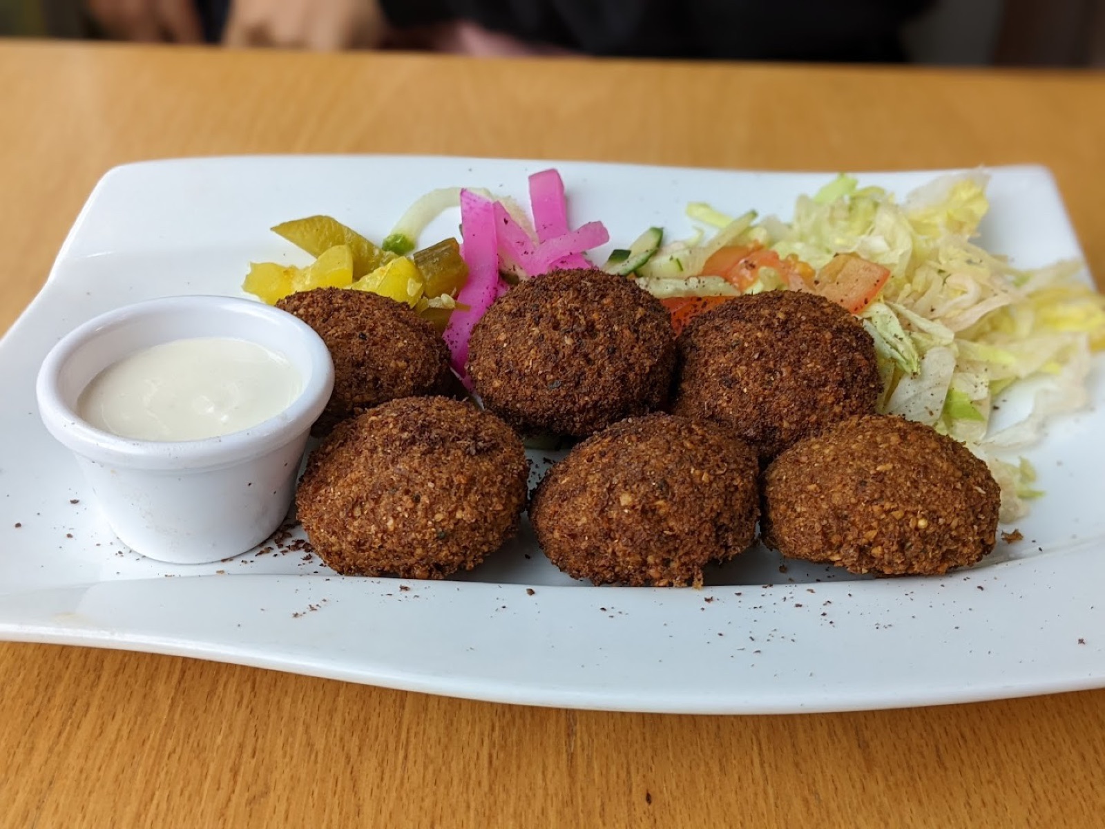 Original phone photo of a falafel plate