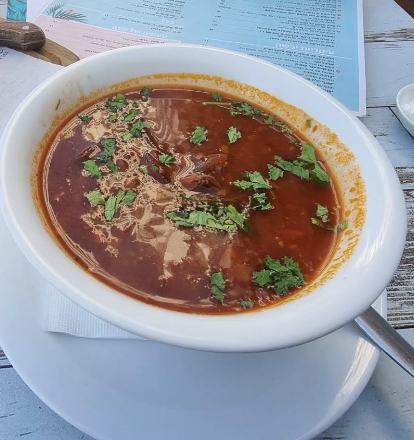 Original phone photo of tomato soup